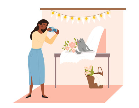 Makes photos of pet. Woman with camera takes picture of cat next to flowers. Photographer and paparazzi at work. Owner with pet. Social network and lifestyle. Cartoon flat vector illustration