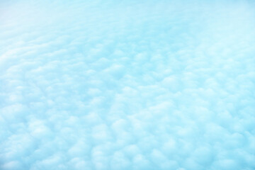 White rolling clouds background . Dense cloudscape background