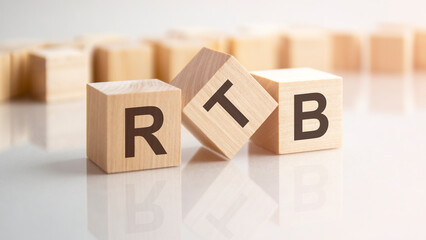 word RTB made with wood building blocks, stock image. background may have blur effect