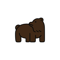 a large brown bear looking back