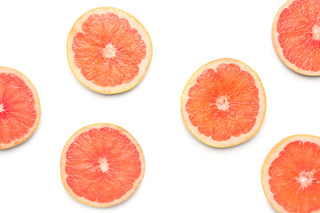 Fototapeta na wymiar Composition with slices of ripe grapefruit on white background