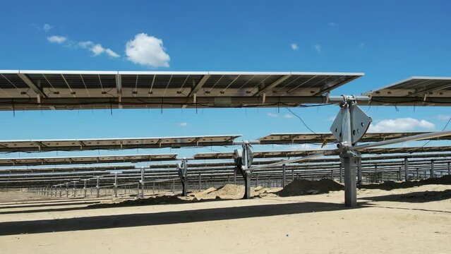 View of solar panels with bifacial technology and tracker from drone never before seen footage with gimbal extender range