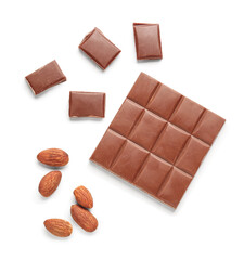 Tasty chocolate and almond nuts on white background