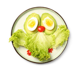 Plate with funny breakfast in shape of owl on white background