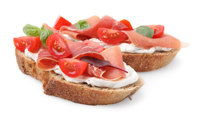 Tasty bruschettas with prosciutto, tomatoes and cheese on white background