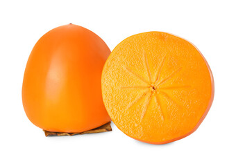 Whole and cut delicious ripe juicy persimmons on white background