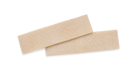 Sticks of tasty chewing gum isolated on white, top view