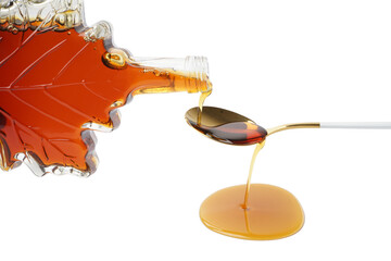 Pouring of tasty maple syrup from bottle into spoon on white background, closeup