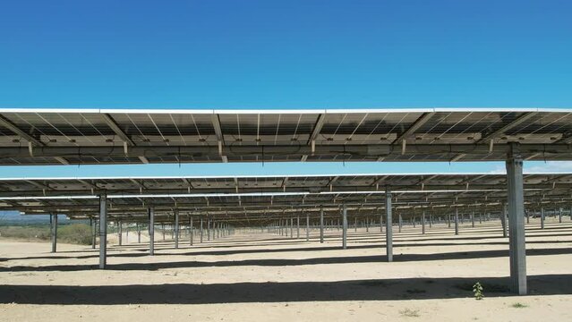 View of solar panels with bifacial technology and tracker from drone never before seen footage with gimbal extender range