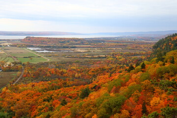 Viewpoint in Cap-Tourment in Quebec and Canada. Autumn landscape and trees. Fall and leaves. Hiking and trail in autumn. Quebec tourism in Canada. September and october background. Hiking and trail.
