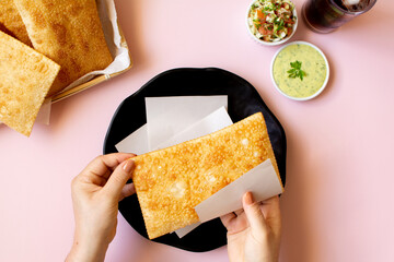 Fried Pastry, Pastel, Brazilian snack, woman hand, top view