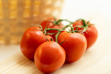 tomatoes on a wooden table

