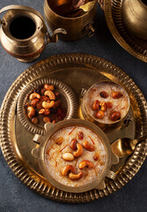 Indian dessert kheer or semiya payasam topped with dried fruits and nuts