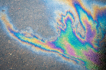 Oil stain, Gas Stain drop from the Car on the Parking Lot Floor
