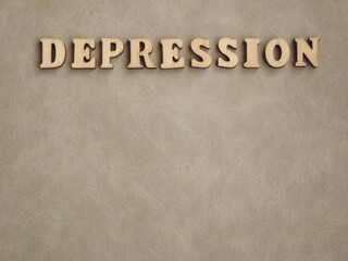 mental illness depression in wooden letters on a black background