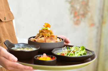 Grilled Pork Belly Sliced ​​Rice with Fragrant Sauce Topped with Stir Fried Onions.