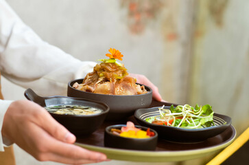 Grilled Pork Belly Sliced ​​Rice with Fragrant Sauce Topped with Stir Fried Onions.