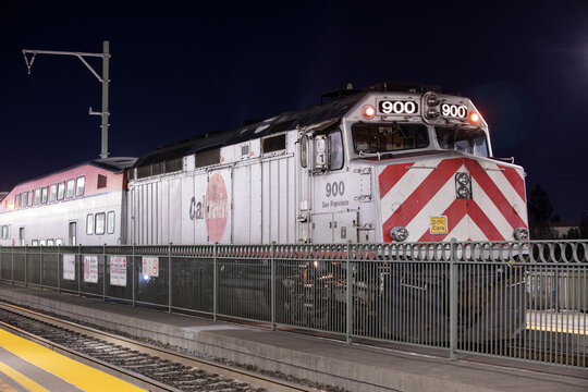 San Carlos, California, USA - January 1, 2023: A north bound Caltrain pulls into the San Carlos station.