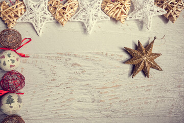Decorations for Christmas on white wooden background. Xmas ornaments