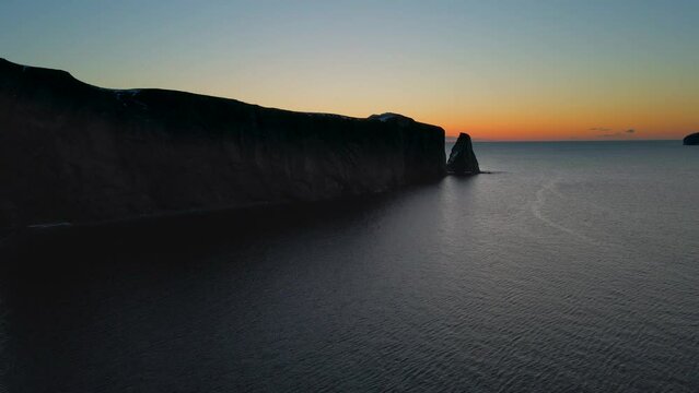 Cinematic drone shot of famous Perce rock in Quebec, Canada