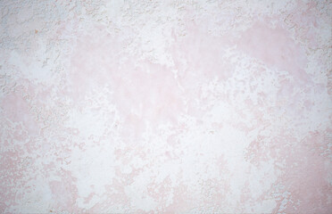 Light background of decorative plaster with abstract spots. Unusual texture of white or gray wall with beautiful patterns, creative surface background. Finishing coating for building cladding.