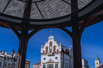 Well and Town hall on main square of Old Town in Rzeszow city, Poland