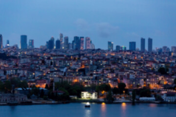 Fototapeta na wymiar Defocused blurred panoramic view of Sisli and Golden horn gulf during twilight time. Vibrant colors. Istanbul, Turkey (Turkiye). Cityscape background