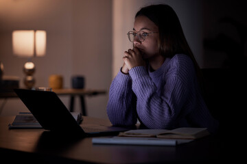 Home laptop, thinking and night woman contemplating university studying research, college project or essay idea. Education learning, knowledge study and female student problem solving report crisis