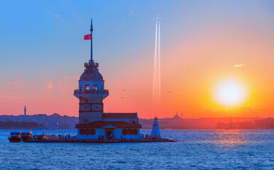 Trail of white smoke from the airplane - Istanbul Maiden Tower (kiz kulesi) - Istanbul, Turkey