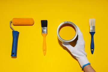 Fototapeta na wymiar Tools for art and repairing - paint, top view