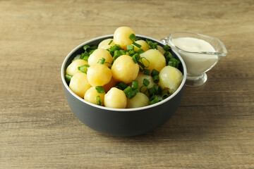 Concept of tasty food with boiled young potatoes