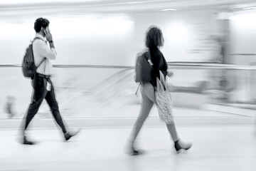 group of people in the lobby business center in monochrome tonality