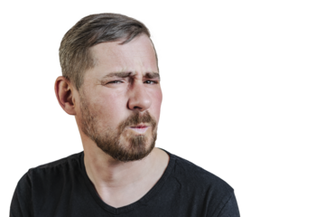 Portrait of an attractive bearded man of European appearance, with a slight gray hair, on an isolated white background. Wrinkles the nose. Expression of emotions of a man
