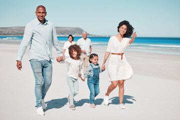 Happy, beach and family holding hands while on a walk together on summer vacation, adventure or...