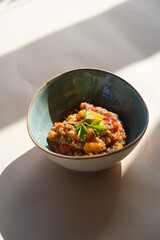 Baked vegetables salad bowl, close-up.
