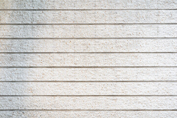 Obraz na płótnie Canvas Cream and white brick wall texture background. Brickwork or stonework flooring interior rock old pattern clean concrete grid uneven bricks design stack.