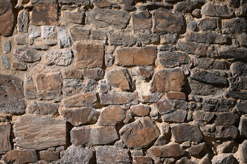 A weathered, traditional house wall in Spain.