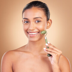 Woman, beauty and derma roller with face, happiness with facial massage and skincare on studio...