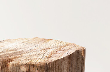 Minimal, natural log wood podium table in beautiful sunlight, leaf shadow in blank cream white...