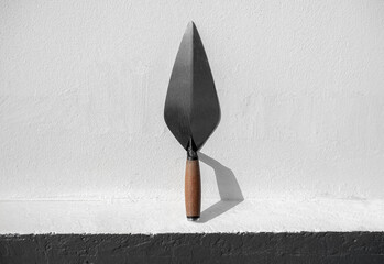 Brick Trowel on white background, brick tools