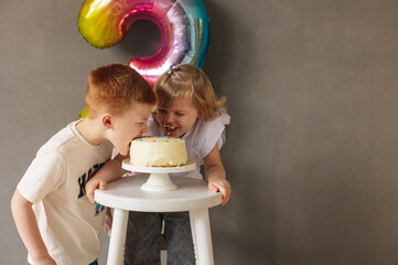 Birthday three years. Happy day. Delicious cake decorated with candles.