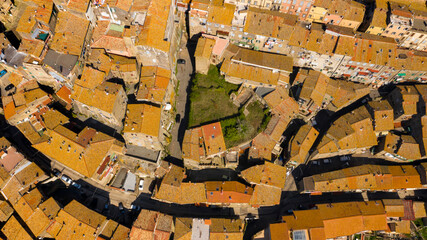 Aerial perpendicular view of Caprarola, a small town near Viterbo, Italy. All houses have...