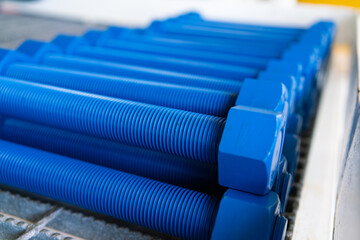 Fototapeta premium Petroleum industrial metal bolts for replacement of worn out bolts with metric threads.