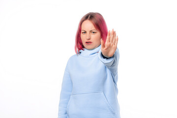 Portrait of young woman say stop, prohibit something, stretching out hand to forbid something....