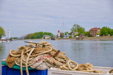 boat on the river with fishing nets