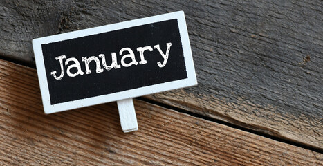 January on chalk board and table.