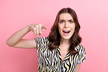 Photo of unsatisfied outraged girl speak scream point finger camera blame you isolated on pink color background - obrazy, fototapety, plakaty