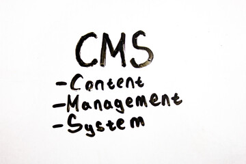 CMS CONTENT MANAGEMENT SYSTEMS text concept written in marker. Content Management System.