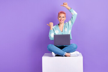 Full length photo of funny hipster woman wear stylish outfit point fingers mockup look new app for it development isolated on purple color background