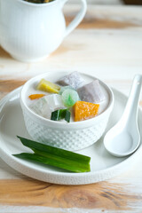 bubur cha cha is Indonesian dessert made from taro, coconut milk, tapioca jelly, sweet potato and palm seed
